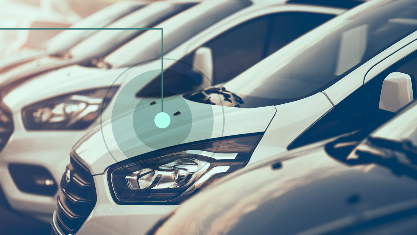 Silver cars parked in a row, with a digital graphic highlighting the middle car's bonnet.