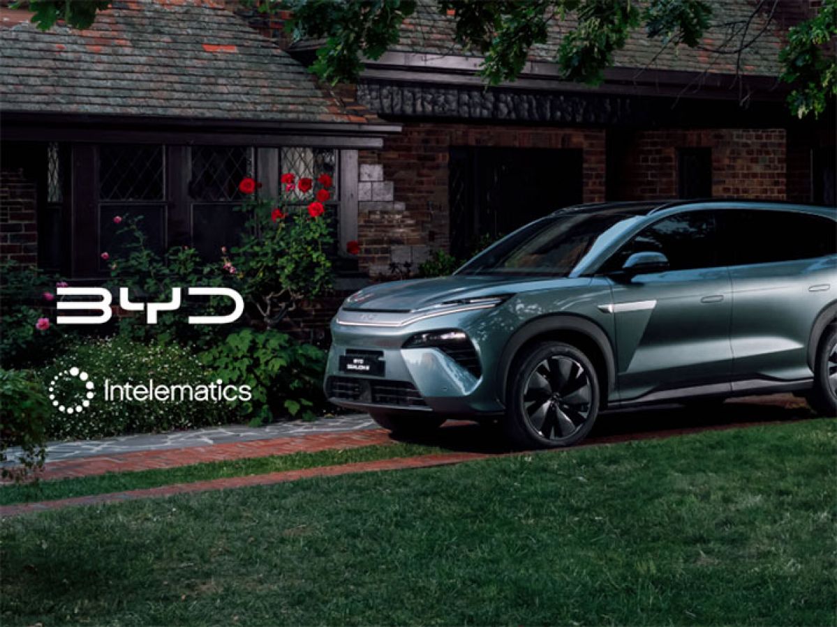 A dark green BYD car parked in front of a house. The BYD and Intelematics logos have been added to the image on the left.