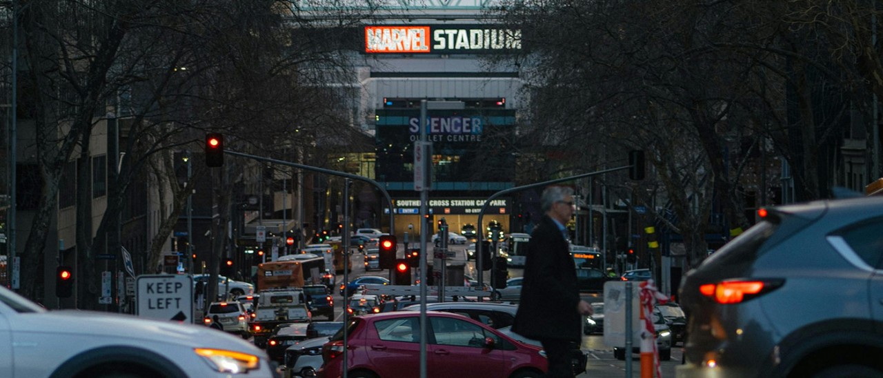 Traffic in Melbourne's CBD in Australia. At the end of the road is Marvel Stadium, Spencer Outlet Centre and Southern Cross Station Car Park