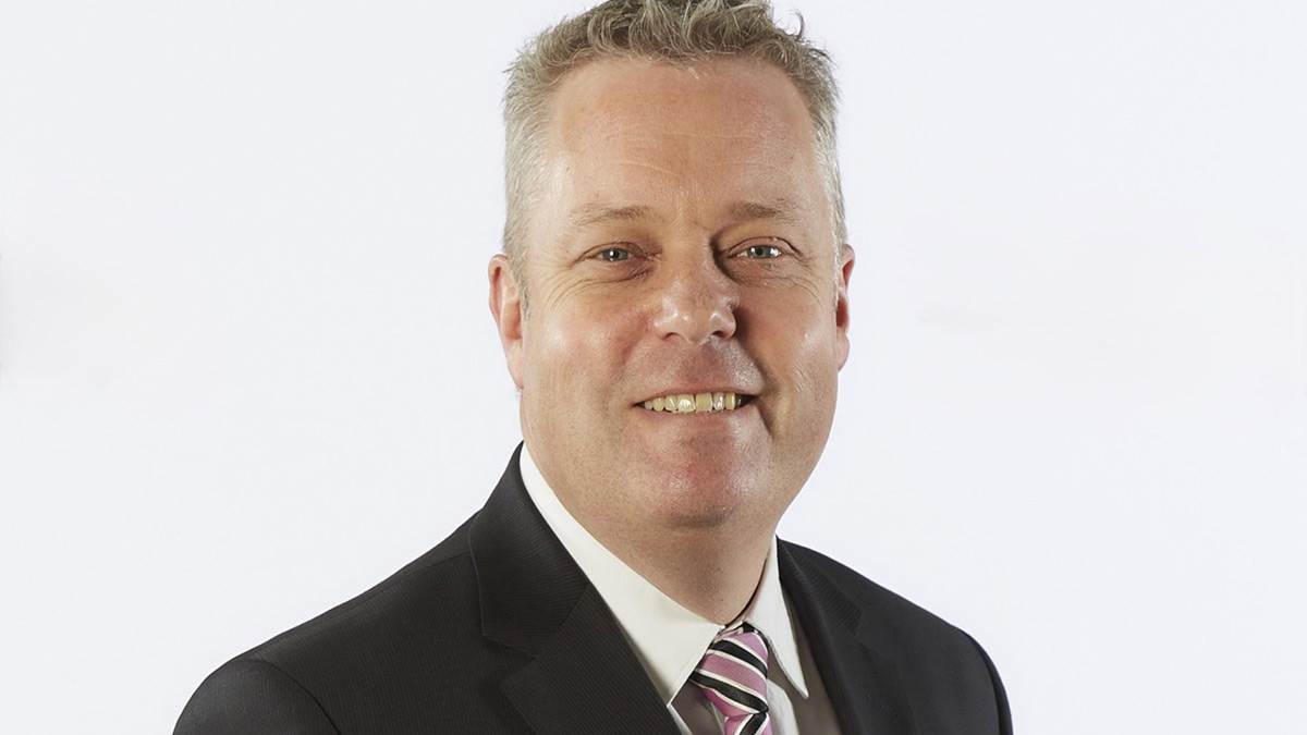 Professional headshot of BYD's Chief Operating Officer, Stephen Collins.