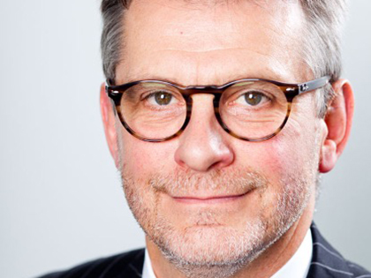 Professional headshot of British APCO Senior Vice President, Andy Rooke.